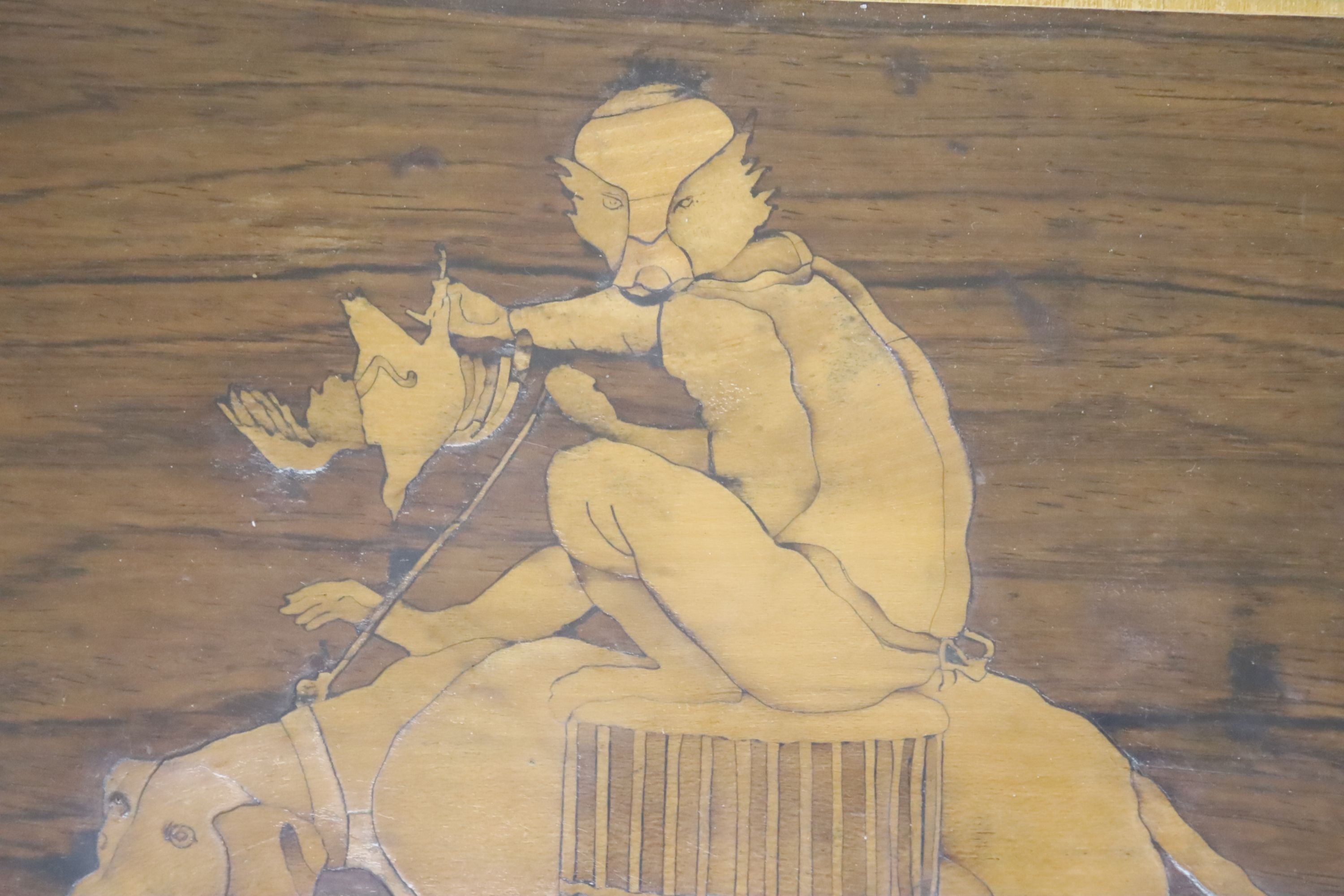 An Italian reversible marquetry picture of a monkey riding a hound, width 28cm